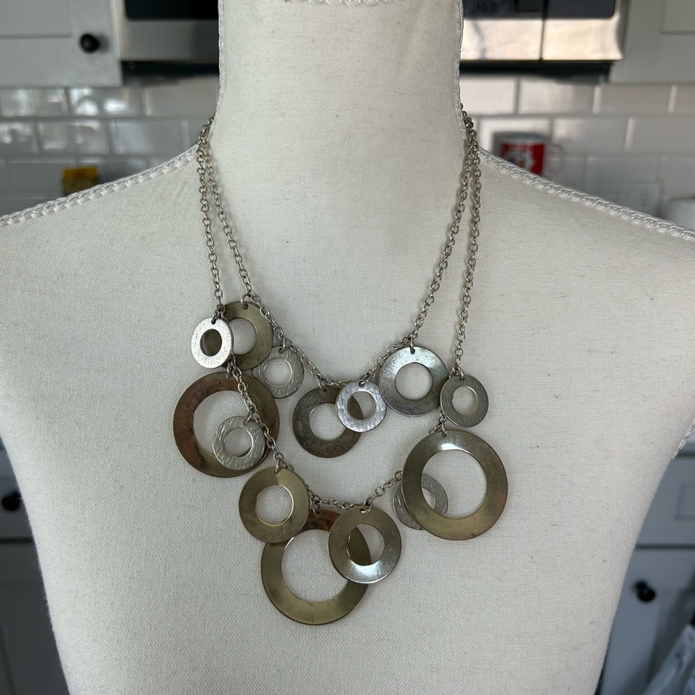 Has a lot of wear Modern Silver-Tone Multi-Ring Necklace
